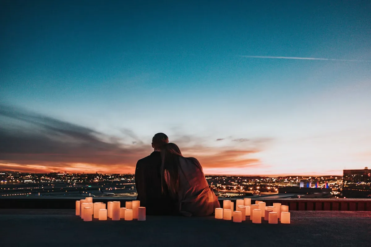 A couple looking out toward the city and their financial future